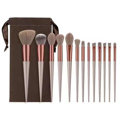 A set of thirteen makeup brushes