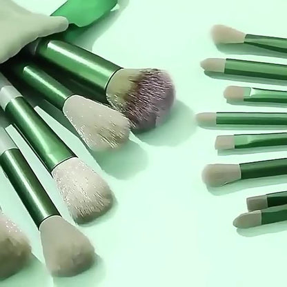 A set of thirteen makeup brushes