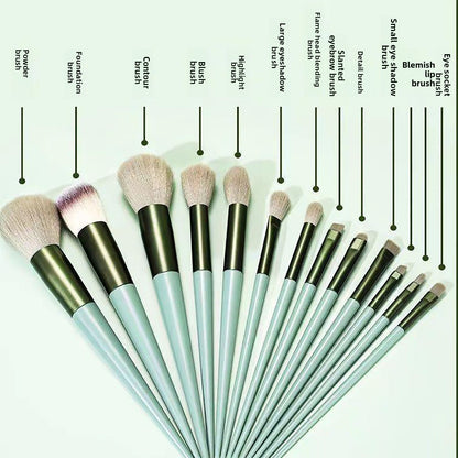 A set of thirteen makeup brushes