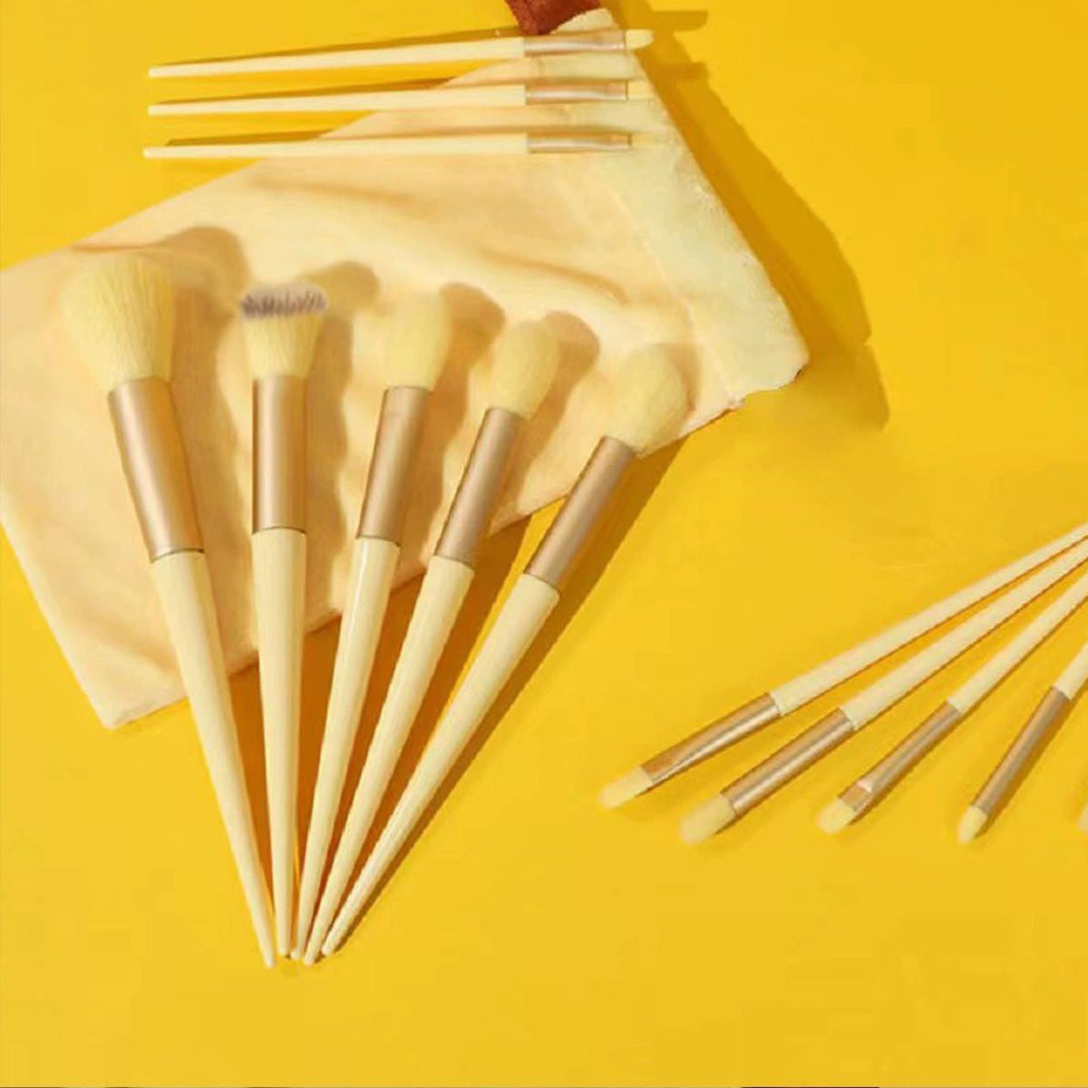 A set of thirteen makeup brushes