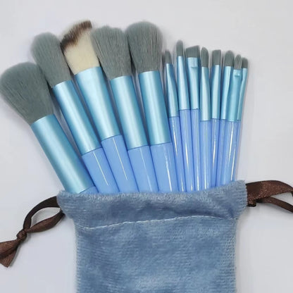 A set of thirteen makeup brushes